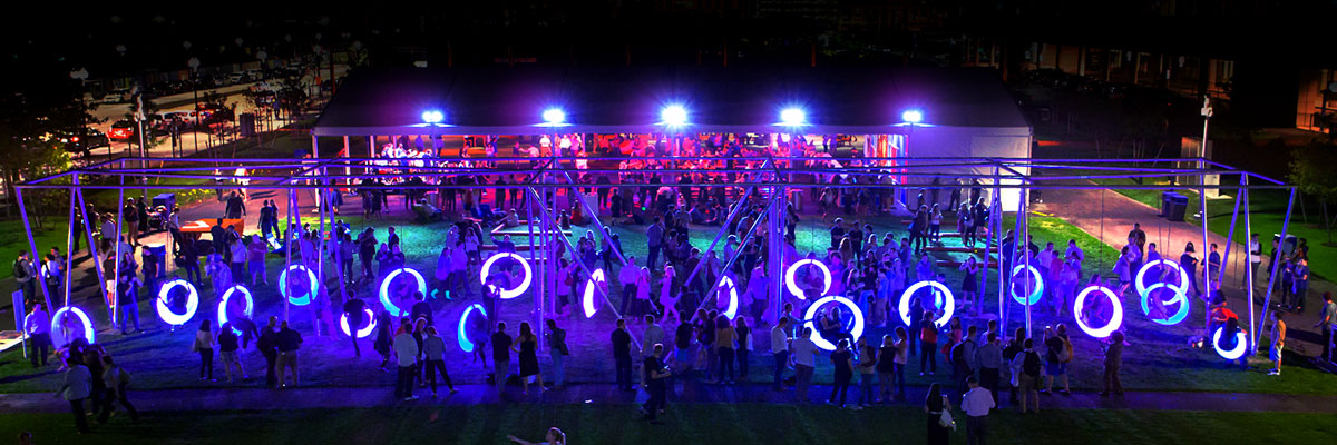 A lawn lit with colorful LED rings